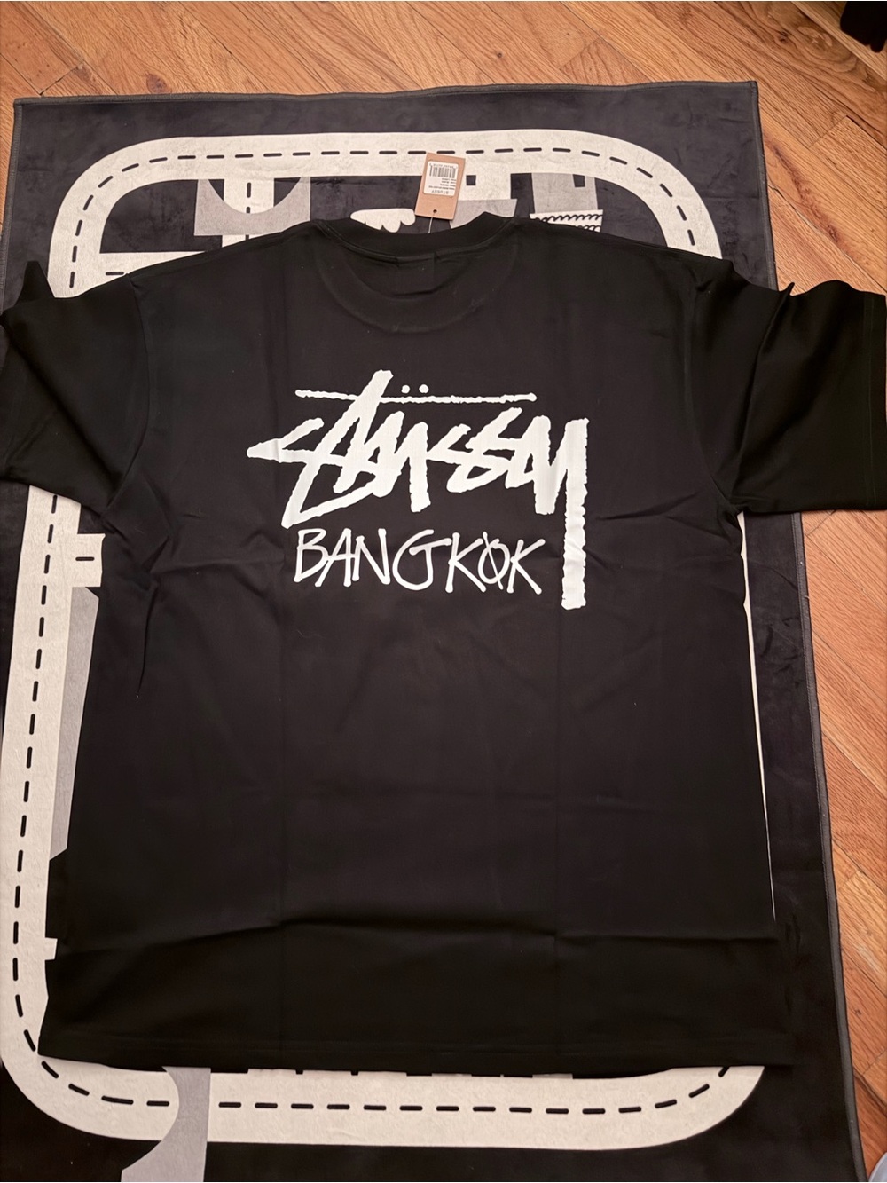 Stussy Black T-Shirt with White Bangkok Graphic